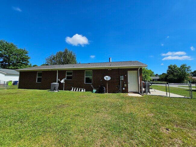 Backyard from trees to house - 419 Rams Rd
