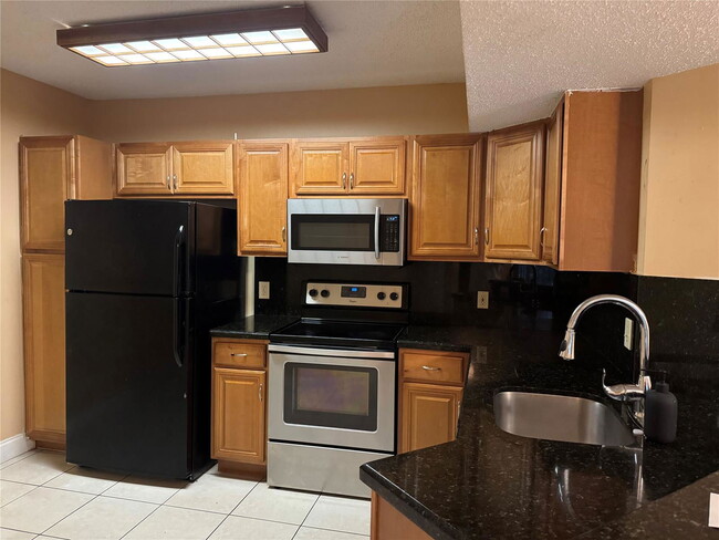 Photo - 9001 Wiles Rd Apartment