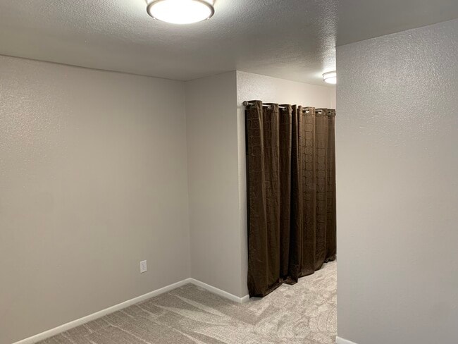 Building Photo - 2201 E 66th Ave