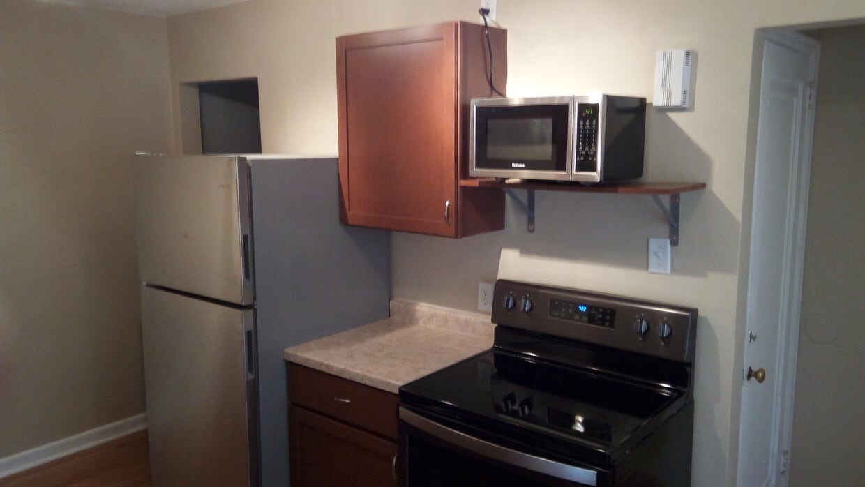 Updated kitchen with newer appliances, countertops, cabinets! - 5634 Nicollet Ave