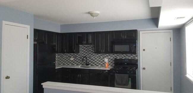 Kitchen and back door - 6820 W Raven St