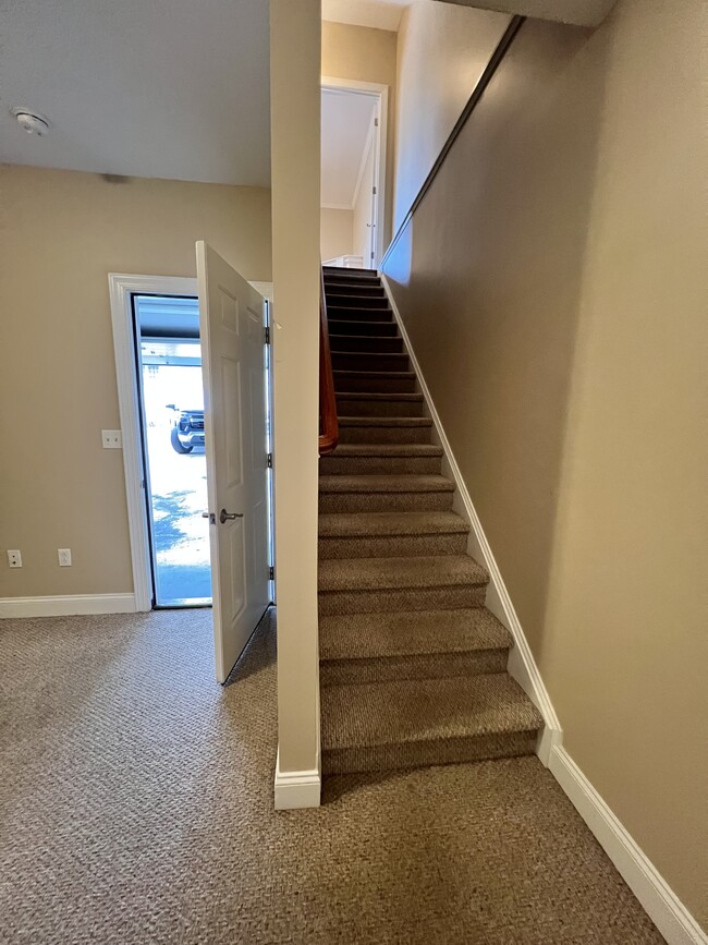 Stairs from Garage to Main Level - 64 Waterside Dr