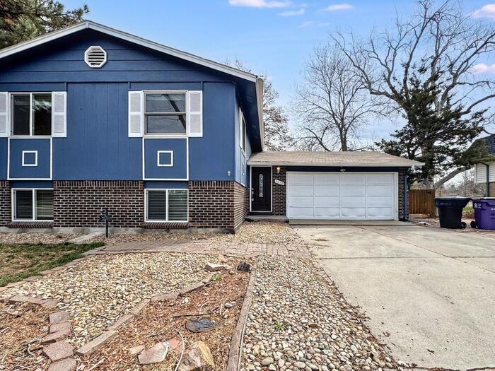 Primary Photo - Spacious 4-Bedroom Home with Modern Amenit...