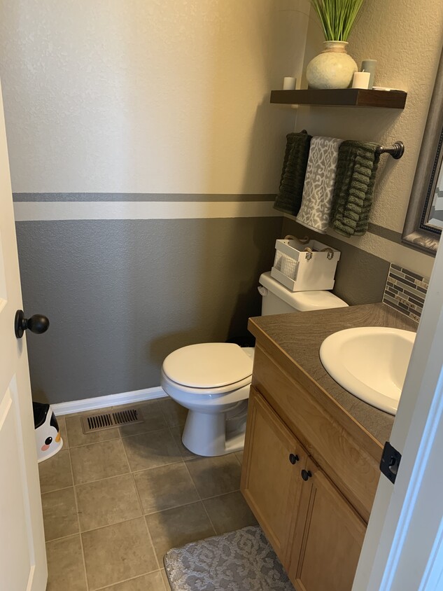 Main level 1/2 bath - 2256 80th Ave