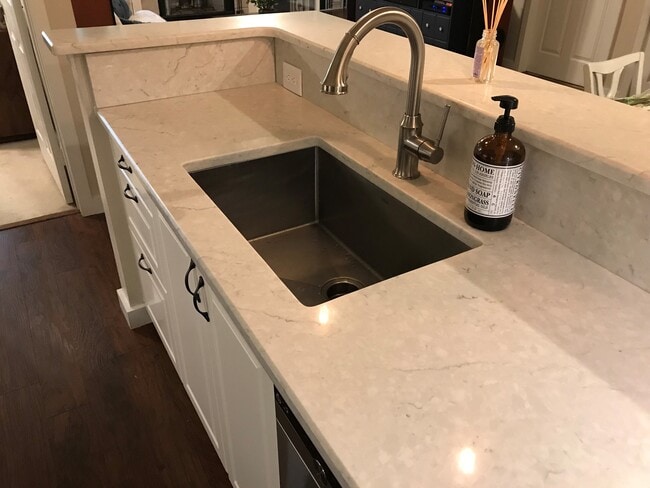 Quartz counter tops and large extra depth stainless steal sink. - 3313 Wyndham Cir