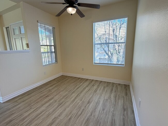 Building Photo - BEAUTIFULLY REFRESHED UPPER-LEVEL CONDO WITH GARAGE & RESORT-STYLE AMENITIES