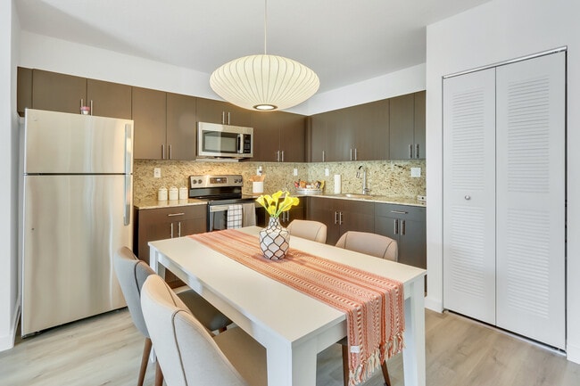 Broadway Unit Dining Room - The Avenue at Naranja Apartments