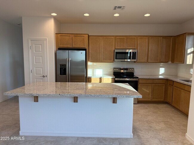 Building Photo - 9973 W Mitchell Ave