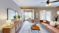 Located at 9400 Havenbrooke Way in Knoxville, Tennessee, this three-story home offers a thoughtfully organized layout spread across multiple levels. The garage level houses a spacious, concrete-floored garage equipped with a water heater and HVAC system, providing ample utility and storage potential.

The main living floor features an open-concept arrangement combining the living room, dining room, and kitchen. The living room is bright and inviting, with large windows that draw in natural light and crown molding that adds a refined architectural touch. The dining area, accented by an elegant pendant chandelier and hardwood flooring, flows seamlessly into the kitchen, which is outfitted with granite countertops, warm maple cabinetry, tile flooring, black appliances, and a convenient breakfast bar. A dedicated office on this level offers a quiet retreat with carpeted floors and a natural-light-filled window.

The upper floor is home to two well-sized bedrooms, two full bathrooms, a hallway, two closets, and a laundry room. The spacious primary bedroom features vaulted ceilings, a ceiling fan, and plush carpet, creating a comfortable and airy atmosphere. The second bedroom mirrors this comfort with carpet, ceiling fan, and ample window light. The bathrooms feature tile flooring and clean, neutral finishes. The dedicated laundry room includes washer and dryer hookups with overhead shelving for added convenience.