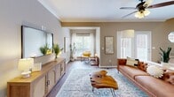 Located at 9400 Havenbrooke Way in Knoxville, Tennessee, this three-story home offers a thoughtfully organized layout spread across multiple levels. The garage level houses a spacious, concrete-floored garage equipped with a water heater and HVAC system, providing ample utility and storage potential.

The main living floor features an open-concept arrangement combining the living room, dining room, and kitchen. The living room is bright and inviting, with large windows that draw in natural light and crown molding that adds a refined architectural touch. The dining area, accented by an elegant pendant chandelier and hardwood flooring, flows seamlessly into the kitchen, which is outfitted with granite countertops, warm maple cabinetry, tile flooring, black appliances, and a convenient breakfast bar. A dedicated office on this level offers a quiet retreat with carpeted floors and a natural-light-filled window.

The upper floor is home to two well-sized bedrooms, two full bathrooms, a hallway, two closets, and a laundry room. The spacious primary bedroom features vaulted ceilings, a ceiling fan, and plush carpet, creating a comfortable and airy atmosphere. The second bedroom mirrors this comfort with carpet, ceiling fan, and ample window light. The bathrooms feature tile flooring and clean, neutral finishes. The dedicated laundry room includes washer and dryer hookups with overhead shelving for added convenience.