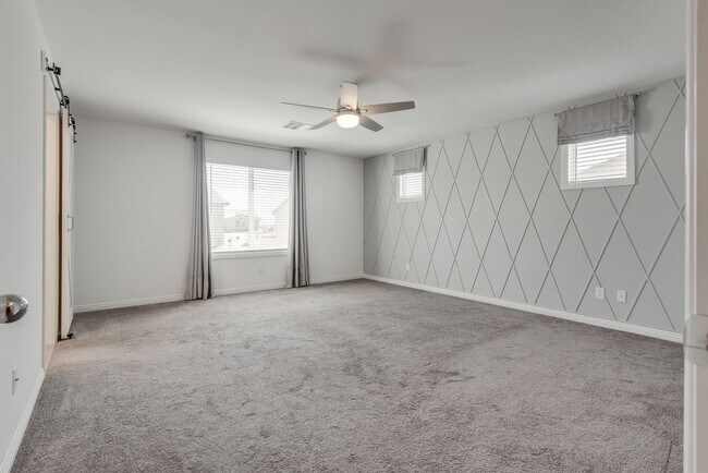 Building Photo - Nestled on a large lot, this two-story sin...