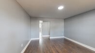 Located at 71 Lakeland Rd in Blackwood, NJ, this well-maintained 2-bedroom, 1-bathroom home offers a thoughtfully utilized single-floor layout with a clean, updated aesthetic throughout. Neutral gray walls and crisp white trim create a cohesive, modern feel across all rooms.

The living room features light wood-look vinyl flooring and windows that allow natural light to fill the space. The kitchen is equipped with rich dark-wood shaker cabinets, light marble-style countertops, a subway tile backsplash, a gas range, and white tile flooring — offering both style and functionality.

The primary bedroom is a generously sized room with dark hardwood-style flooring, recessed lighting, and an en-suite connection. The second bedroom features light vinyl plank flooring, a double-door closet, and access to an adjoining room, making it a versatile space. Both bedrooms receive natural light through double-pane windows with baseboard heating underneath.

The full bathroom is finished with white ceramic tile flooring, a white vanity with shaker-style cabinetry, a tub/shower combo, and a window for natural ventilation. The overall design of the home is clean, functional, and move-in ready, offering a comfortable living environment in a residential Blackwood neighborhood.