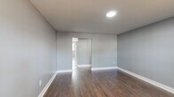 Located at 71 Lakeland Rd in Blackwood, NJ, this well-maintained 2-bedroom, 1-bathroom home offers a thoughtfully utilized single-floor layout with a clean, updated aesthetic throughout. Neutral gray walls and crisp white trim create a cohesive, modern feel across all rooms.

The living room features light wood-look vinyl flooring and windows that allow natural light to fill the space. The kitchen is equipped with rich dark-wood shaker cabinets, light marble-style countertops, a subway tile backsplash, a gas range, and white tile flooring — offering both style and functionality.

The primary bedroom is a generously sized room with dark hardwood-style flooring, recessed lighting, and an en-suite connection. The second bedroom features light vinyl plank flooring, a double-door closet, and access to an adjoining room, making it a versatile space. Both bedrooms receive natural light through double-pane windows with baseboard heating underneath.

The full bathroom is finished with white ceramic tile flooring, a white vanity with shaker-style cabinetry, a tub/shower combo, and a window for natural ventilation. The overall design of the home is clean, functional, and move-in ready, offering a comfortable living environment in a residential Blackwood neighborhood.