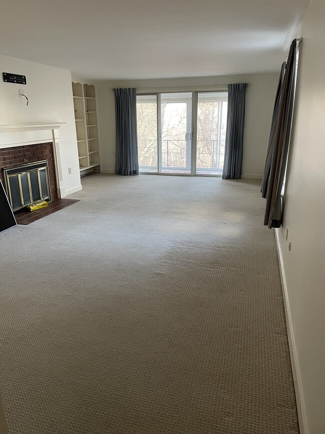 Living room with 3 season room to the rear - 5 Highview Dr