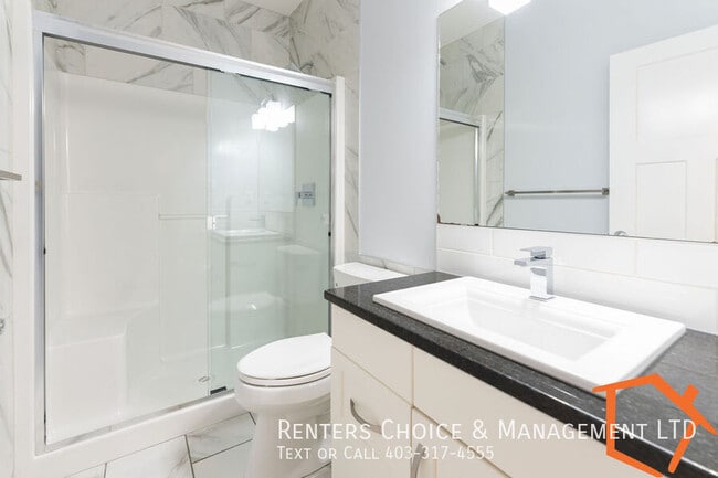 Building Photo - NEW PRICE! 2 Bedroom Basement Suite Utilities Included
