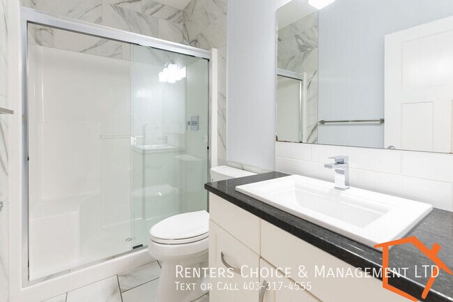 Photo du bâtiment - NEW PRICE! 2 Bedroom Basement Suite Utilities Included