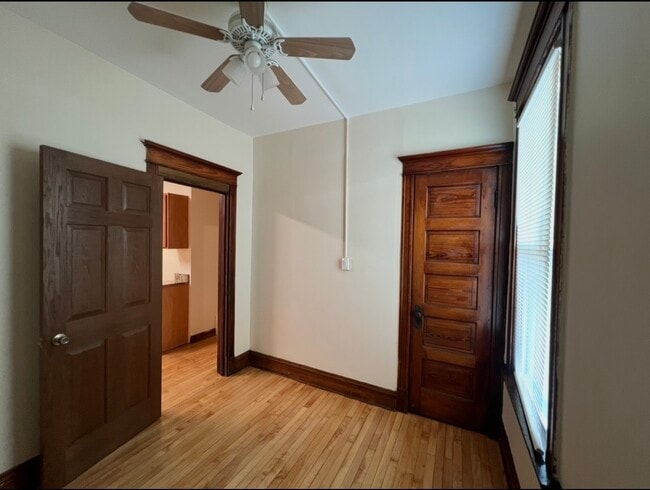 Number #3 bedroom with a closet and ceiling fan - 3748 W Lyndale St