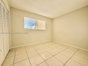 Building Photo - 8750 N Sherman Cir
