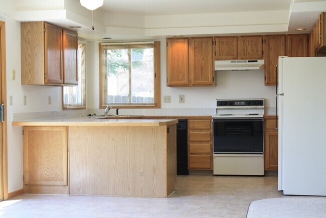 Building Photo - All New Flooring! Huge basement Available ...