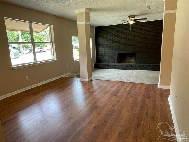 Building Photo - 6975 Woodley Dr