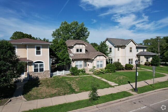 A row of two-story character homes in Brooklyn Center.