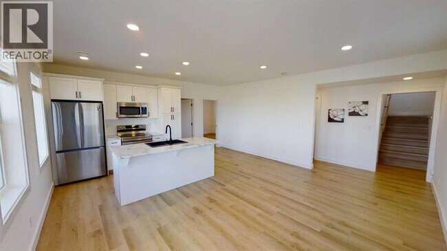 Photo du bâtiment - 12018-12077 77 Ave