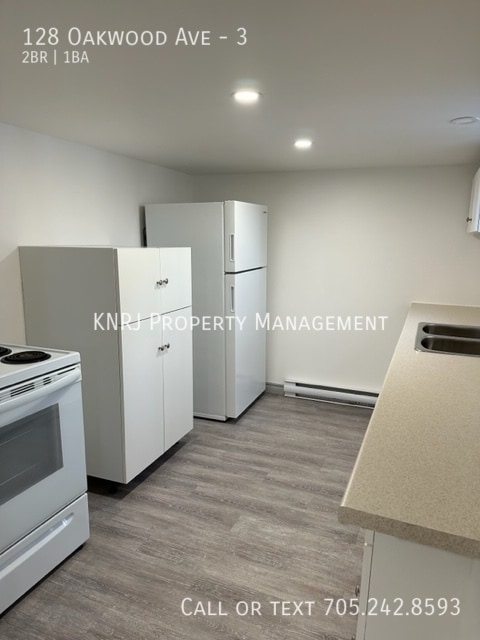 Building Photo - Two Bedroom Basement Apartment