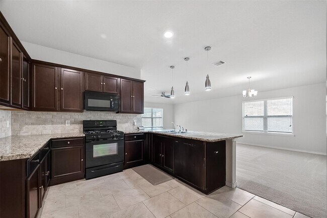Foto del edificio - 17711 Rose Summit Ln