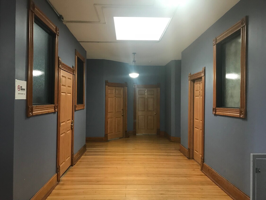 Skylight above East side hallway. Studio is first door on the right. - 605 Forest Ave