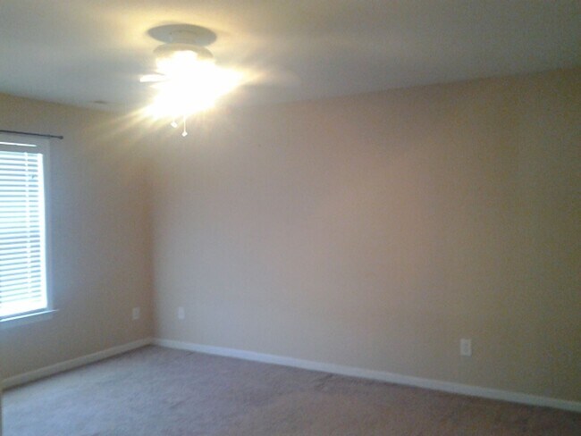 Building Photo - Stunning four bedroom two and a half bath home located in Brookstone subdivision. Covered front p...