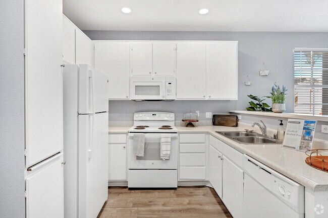 2 habitaciones, 2 baños, 889 pies cuadrados, cocina - Silverhawk Apartments