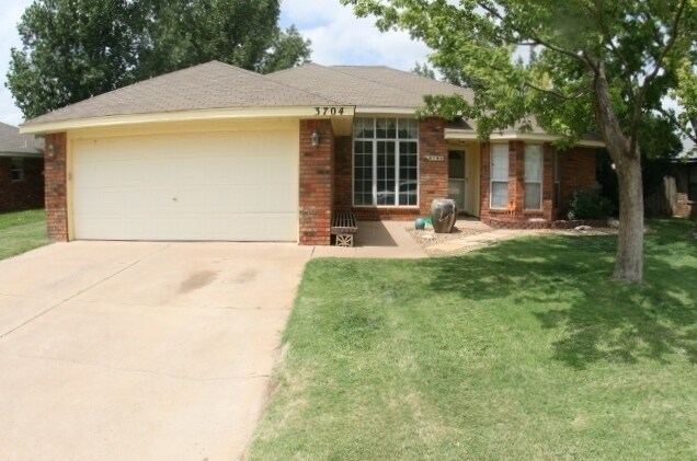 Primary Photo - Brick 3 Bedroom Home! Stunning Backyard! M...