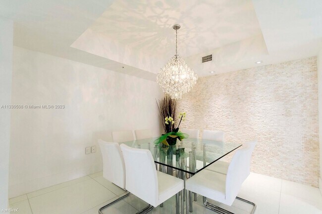Building Photo - 3 br, 3.5 bath Condo - 16275 Collins Ave A...
