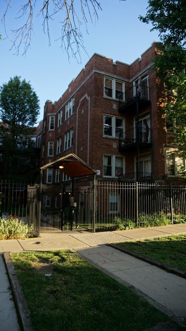 Building Photo - 1663 W Pratt Blvd