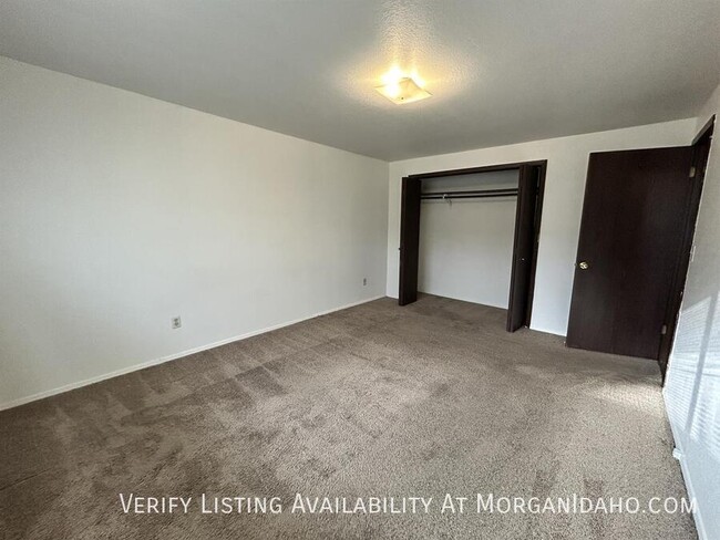 Building Photo - Wood floors, fireplace and updated finishes!