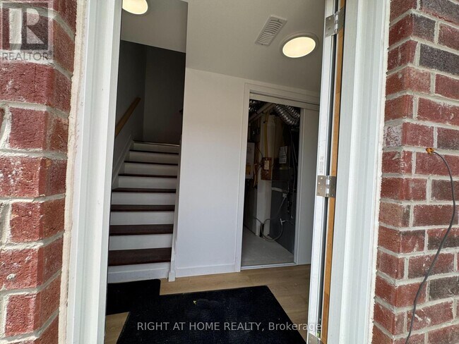 Photo du bâtiment - 113 HighRiver Trl