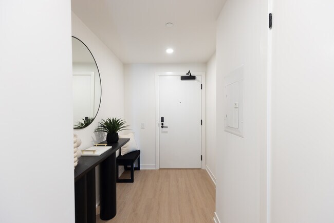 Photo du bâtiment - New Rental Living