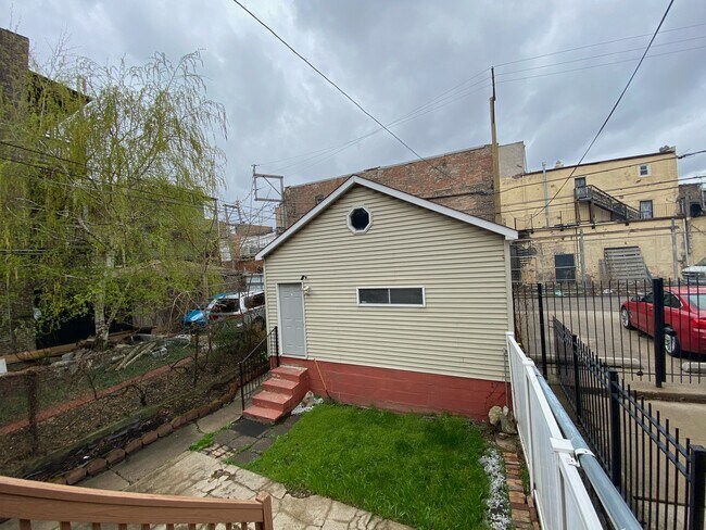 One Car Parking in 2 car garage - 922 S Claremont Ave