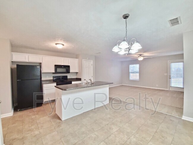 Building Photo - 4852 Laura Jeanne Blvd