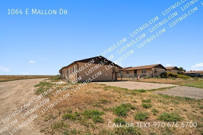 Building Photo - 1064 E Mallon Dr