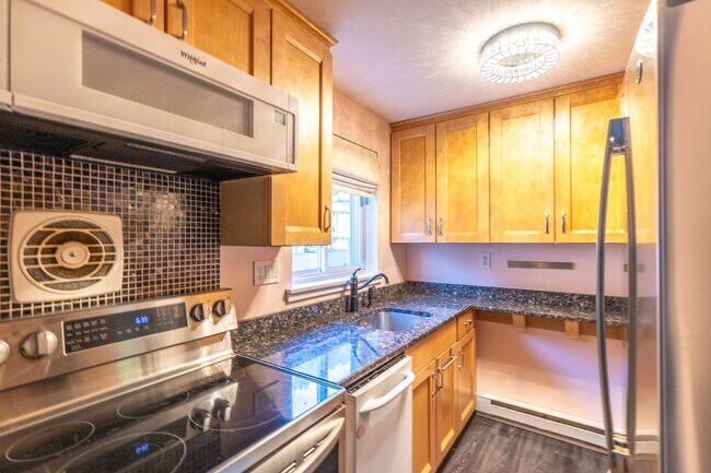 Foto del edificio - Cozy split level 2 Bedroom Condo