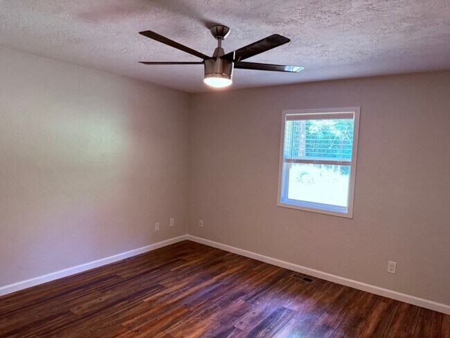 Building Photo - BEAUTIFUL UPDATED RAMBLER WITH LARGE GARGE