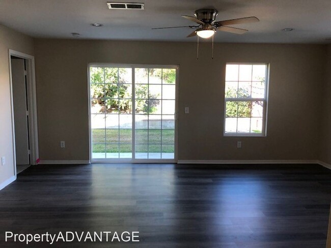 Building Photo - 4 br, 3 bath House - 7676 Flanders Drive