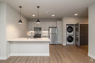 2BR, 2BA - 1,109SF - Kitchen - The Junction at Rogers