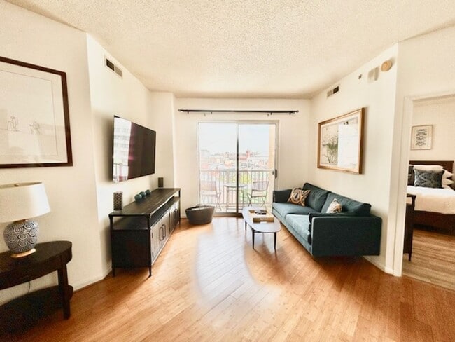 Building Photo - Welcome to this 2BD/2BA home at The Eleven with a BALCONY - GARAGE PARKING - 1 STORAGE UNIT!