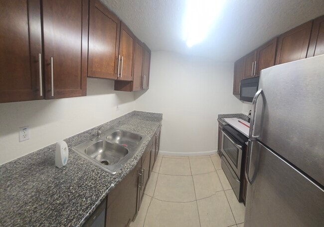 Building Photo - 8950 SW 69th Ct