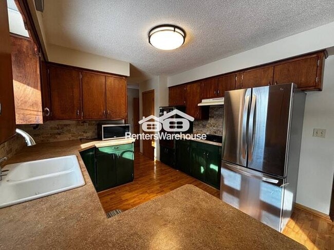 Building Photo - Available now! Welcome home to this 4 bed 2 bath single family home in Farmington with a spacious...