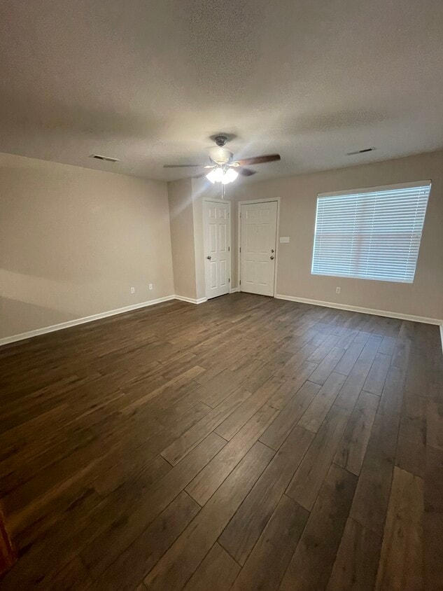 Living room features ceramic flooring - 5191 County Road 73