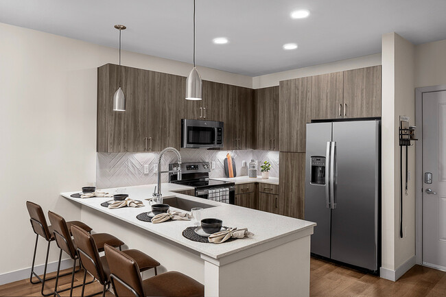 Cocina elegante para residentes - Serenza at Ocoee Village Apartments