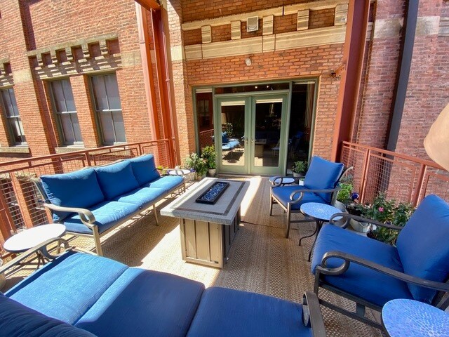 Deck looking toward doors to the unit - 635 W Lakeside Ave